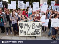 campaigners-during-a-pro-choice-demonstration-outside-the-houses-of-CW2CDD.jpg