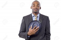 25006479-young-black-businessman-being-polite-by-taking-hat-off.jpg