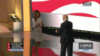 melania-trump-donald-trump-hug-6cabd580-7ab6-42d7-81d2-99810ec6ca68.gif