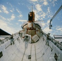 astronaut-van-hoften-in-shuttle-cargo-bay-41c-science-photo-library.jpg