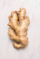 36950088-raw-ginger-root-on-white-wooden-background-top-view.jpg