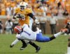 tennessees-tauren-poole-28-runs-around-floridas-janoris-jenkins-1-during-second-half-action-sat.jpeg