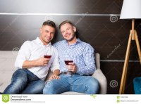 two-married-guys-together-couch-love-relationships-two-sexy-guys-together-couch-123027588.jpg