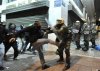 greek-riot-police-falling.jpg