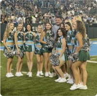 Coach O with Tulane Cheerleaders.jpeg