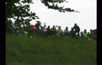 The Gloucestershire Cheese Roll, where Brits chase a roll of cheese down a very steep hill - GIF.gif