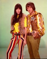 sonny-bono--cher-point-guns-toward-the-camera-as-they-pose-for-a-portrait-in-circa-1968-photo-...jpg