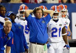 Jim McElwain struck the best surrender cobra pose during the SEC  championship game | For The Win