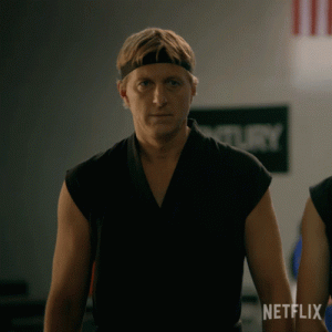 cobra-kai-johnny-raising-fist-ipmz3ly9qdp5k2ds.gif