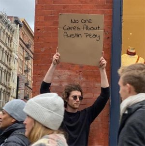 Guy Holding Cardboard Sign 28042024054514.jpg