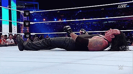 the-undertaker-wrestle-mania.gif