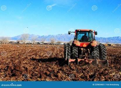 tractor-plowing-field-22983460-1463412348.jpg