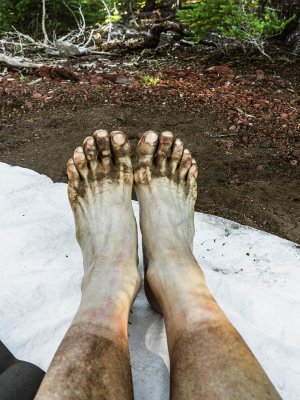 dirty-feet-of-a-female-backpacker-ron-koeberer.jpg