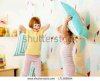 stock-photo-kids-sisters-playing-with-pillows-in-the-bedroom-171389984.jpg