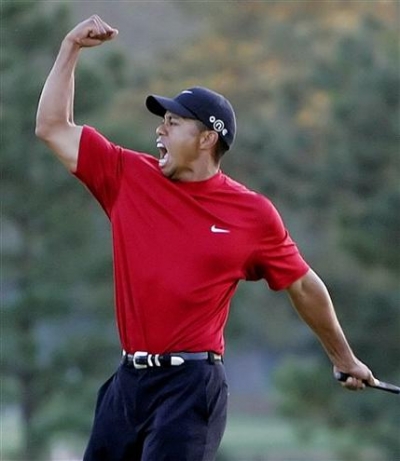 tigerwoods_fist_pump1250631906.jpg