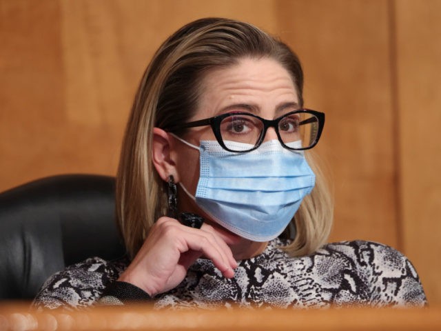 Kyrsten-Sinema-upclose-mask-getty-640x480.jpg