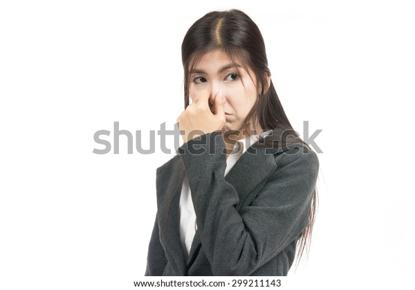 asian-woman-holding-her-nose-600w-299211143.jpg