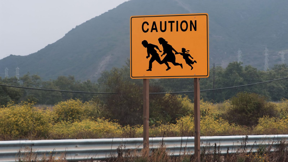 immigrantsign_1200x675.jpg