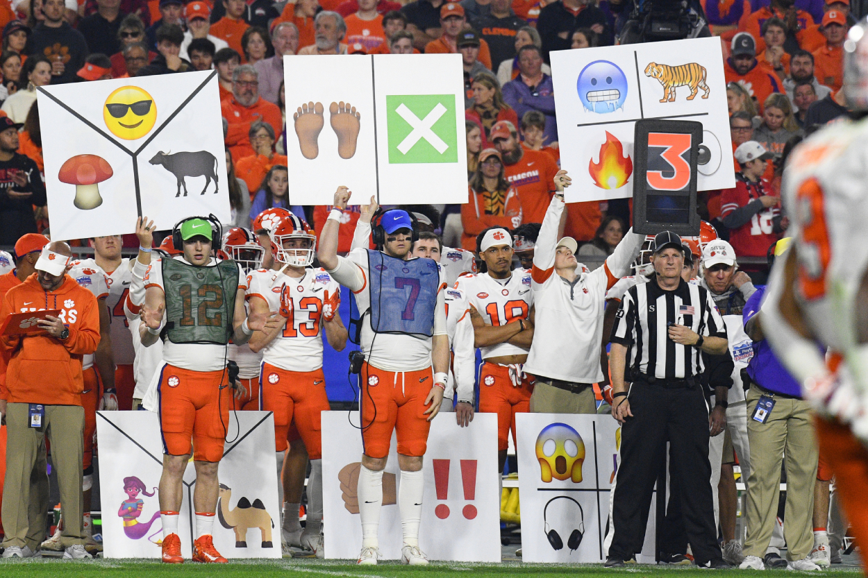 Why Do College Football Teams Hold up Signs for the Offense?