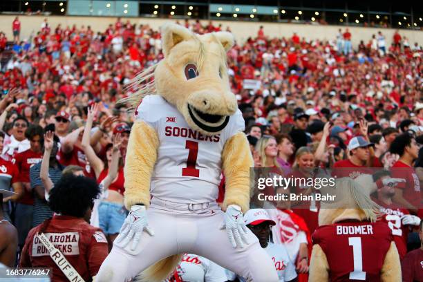 norman-oklahoma-sooner-a-mascot-for-the-oklahoma-sooners-dances-with-boomer-during-a-break-in.jpg